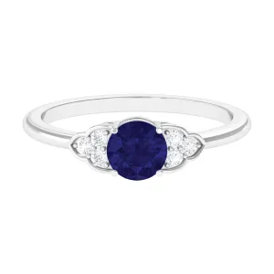 Blue Sapphire Engagement Ring with Diamond Trio