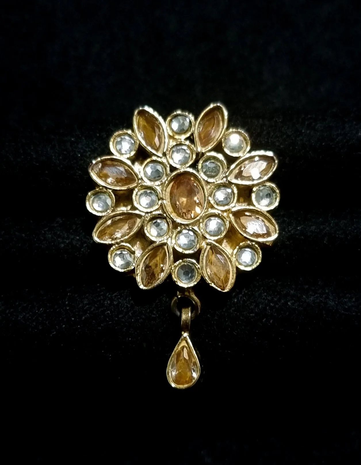 Kundan with champagne stones adjustable ring.